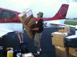 Haiti Relief Flight Loading Airplane