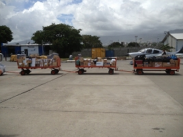 Haiti Relief Flight Supplies on Cart